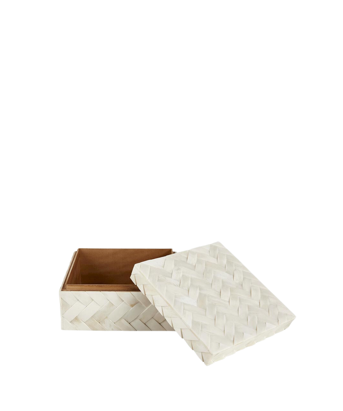 A square decorative box with a woven, ivory-colored herringbone pattern. The smooth, monochrome texture evokes elegance and simplicity.
