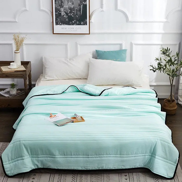 Lightweight cooling cotton summer blanket from LondonLaneStore, breathable and soft bedding perfect for warm nights.