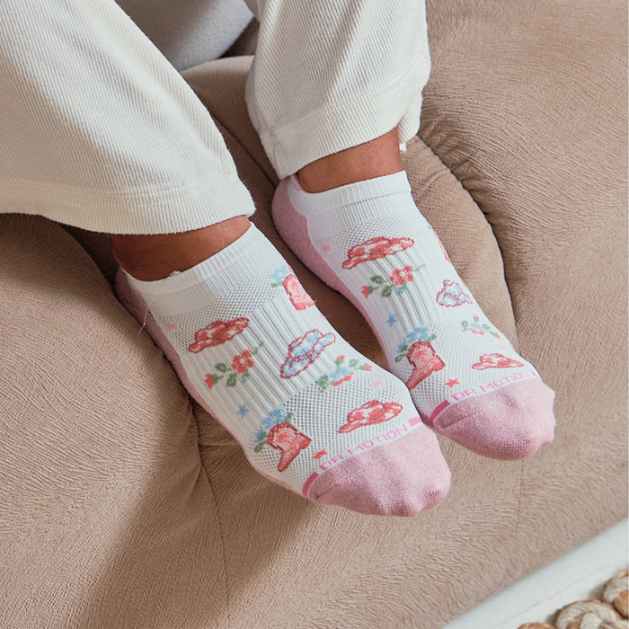 Ankle socks featuring a floral and cowgirl boot design with a pink toe and heel.