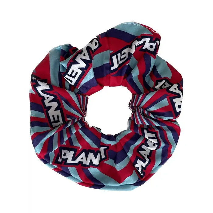 Colorful scrunchie with ’PLANET’ text.