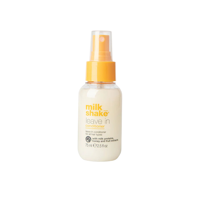 milk_shake leave-in conditioner bottle with yellow cap on a white background
