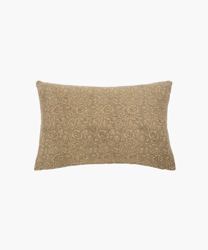 A rectangular lumbar beige pillow featuring an ornate floral pattern. The intricate design conveys a classic, elegant feel, suitable for cozy home decor. | Wildwood Home Co.