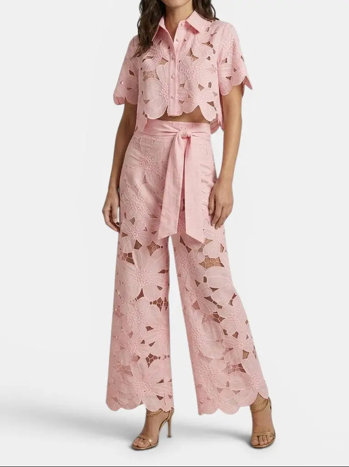 Women's floral lace co-ord set with elegant cropped top and wide-leg trousers, perfect for spring and summer.