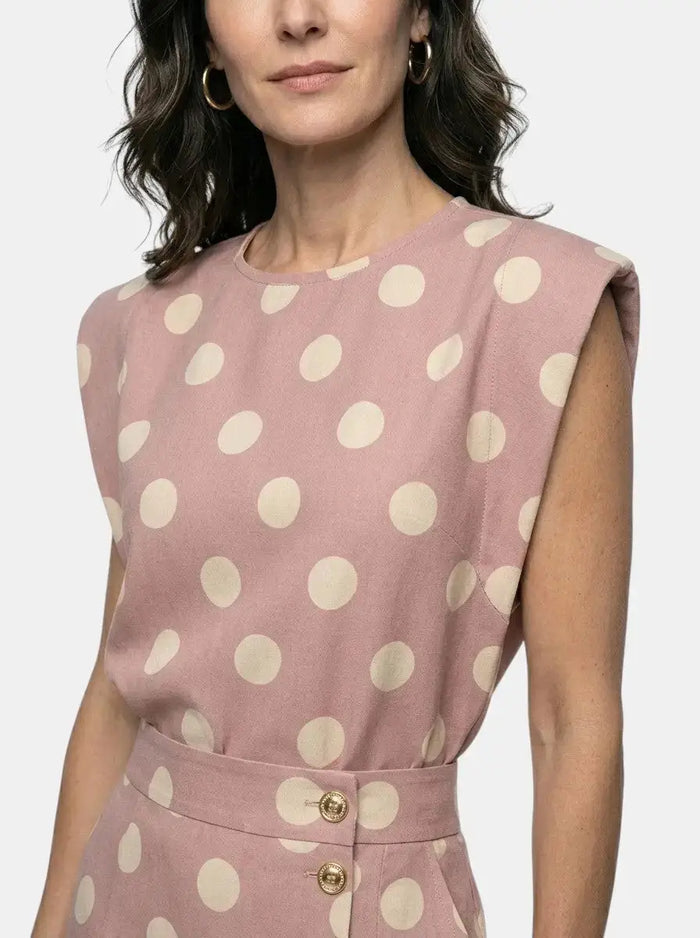 Women's polka dot print two-piece set featuring a sleeveless tailored top and high-waist midi skirt from LondonLaneStore.