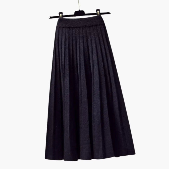 Women's ribbed knit pleated maxi skirt with flowing ankle-length design and elegant textured fabric by LondonLaneStore.
