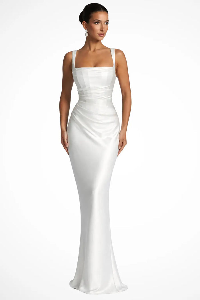 Women’s satin maxi dress with structured square neckline and ruched design, featuring elegant drape and shimmering fabric.
