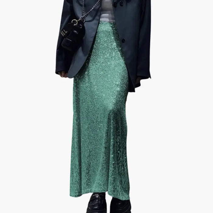 Shimmering sequin high-waisted maxi skirt for women, elegant evening wear featuring a flowing design and sparkling embellishments.