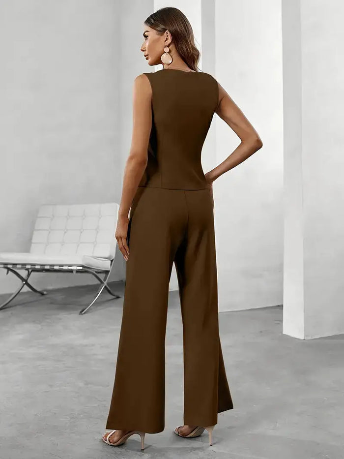 Women's tailored polyester pant suit featuring a sleek sleeveless blazer and wide-leg trousers, stylish office-ready set by LondonLaneStore.