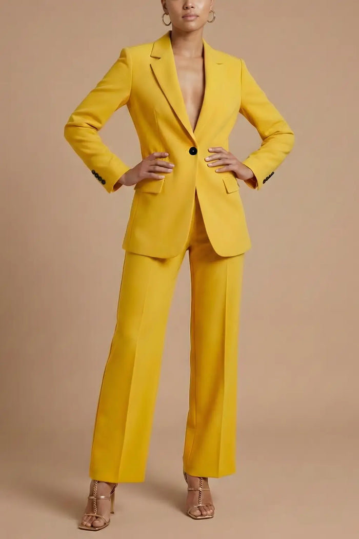 Women’s tailored polyester suit featuring an elegant blazer and wide-leg trousers, styled for sophisticated office wear.