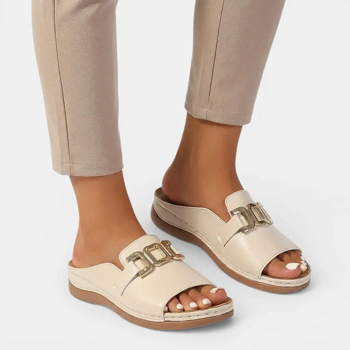Women's vegan leather orthopedic sandals with chic wedge heels and comfortable design, featuring supportive footbed and stylish appearance.