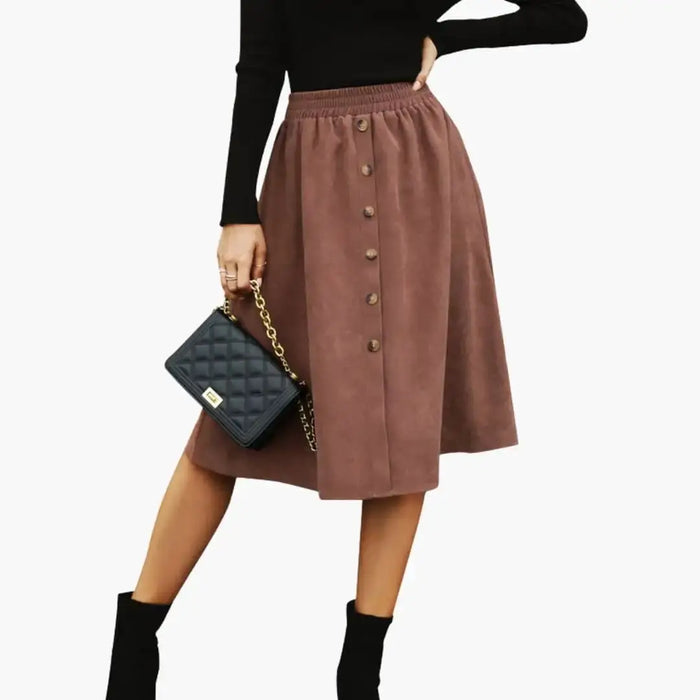 Women’s woven midi skirt with straight cut and button details, stylish and lightweight, perfect for casual or semi-formal wear.