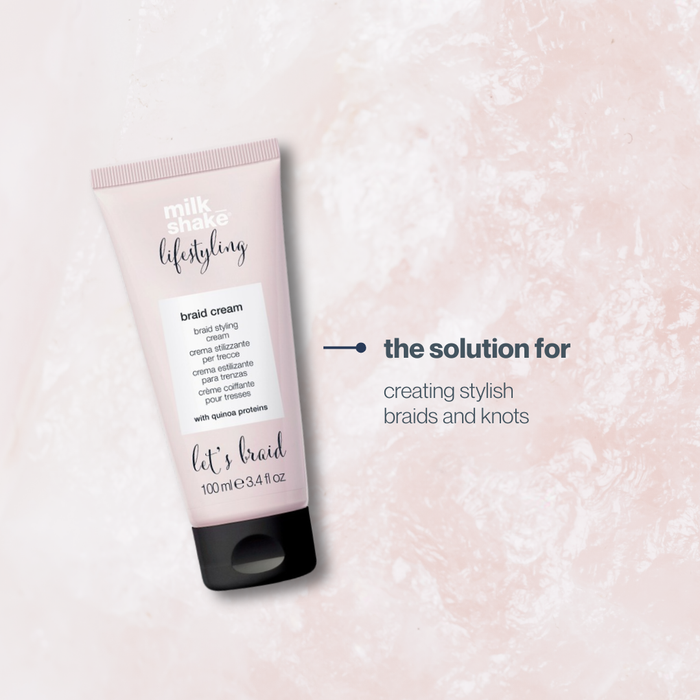 Tube of milk_shake  styling braid cream on a pink textured background