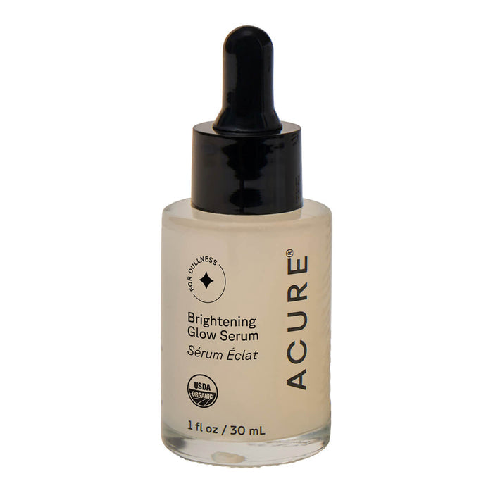 Dropper glass bottle of serum on a white background.