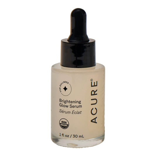Dropper glass bottle of serum on a white background.