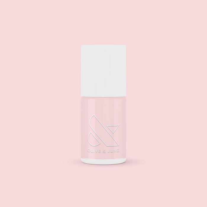 CCT nail polish bottle in sheer neutral pastel pink for a delicate and natural manicure look
