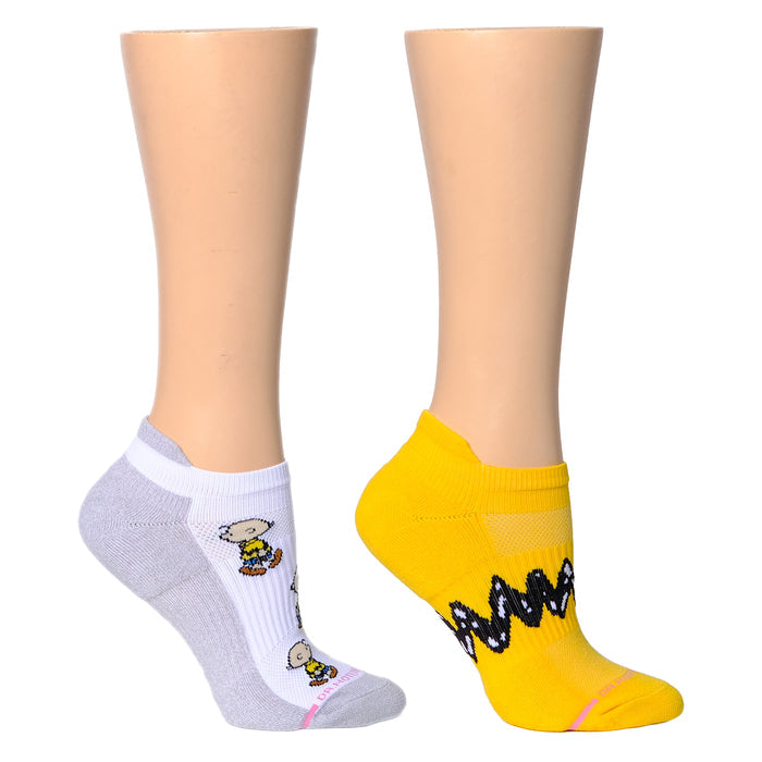Ankle compression socks featuring a gray sock with a character design and a yellow sock with a zigzag pattern.