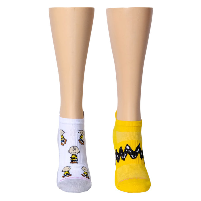 Ankle compression socks featuring a white design with cartoon characters and a yellow zigzag pattern.