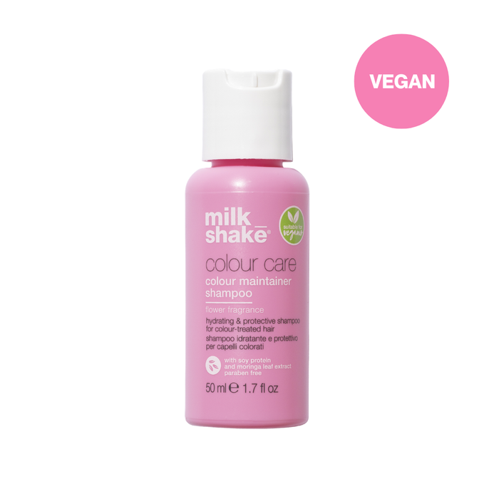 Pink shampoo bottle with 'milk_shake' branding on a white background