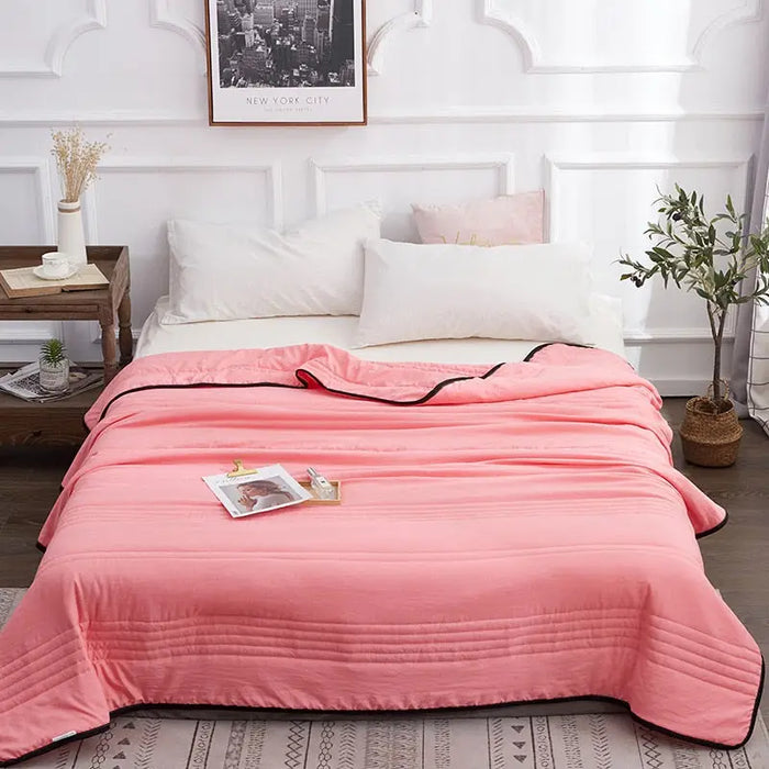 Cooling cotton summer blanket from LondonLaneStore, soft lightweight sleep cover with breathable, comfortable bedding for warm nights.