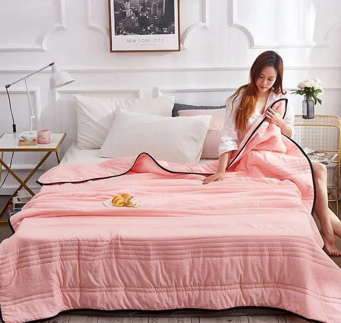 Lightweight cooling cotton summer blanket from LondonLaneStore, soft, breathable bedding for comfortable sleep during warm nights.