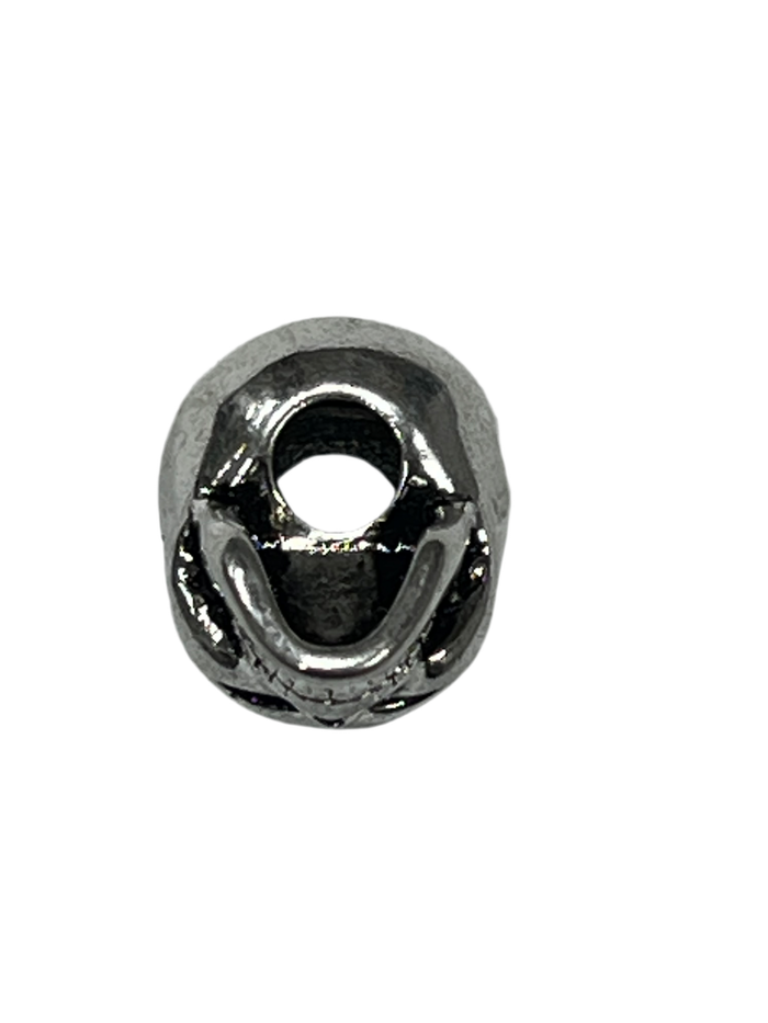 Top view of Silver Skull Hair Bead, Dead Man’s silver-overlay braid and loc accessory.