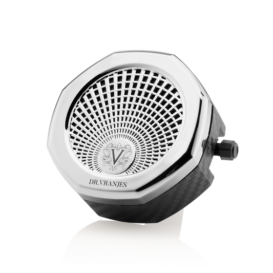 A chrome finish Carparfum diffuser designed to be attached to a car's ventilation system, with a visible logo and grid-like pattern.