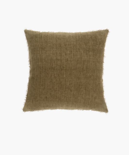 A square, olive green throw pillow with a soft, textured fabric and fringed edges. The earthy tone conveys a calm, cozy, and natural aesthetic. | Wildwood Home Co.