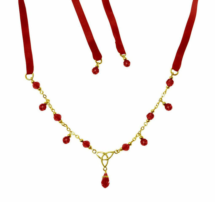 Gold Eternity Tie-On Crown and Necklace with red ribbon ties, Celtic trinity knot centerpiece, and red crystal bead accents, front view.