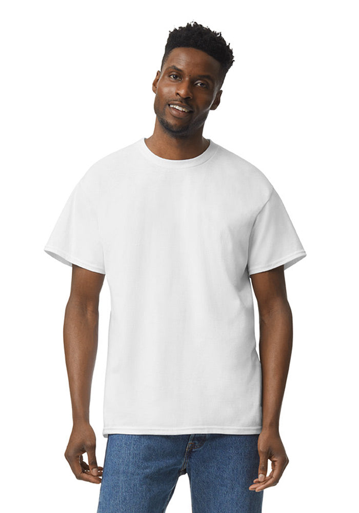 Man wearing a white Gildan 5.3oz. Cotton Short Sleeve T-shirt and blue jeans on a white background.