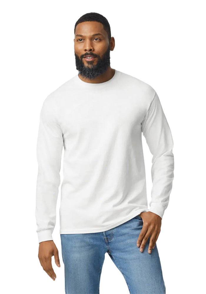 Man wearing a Gildan 5.3oz. Cotton Long Sleeve T-shirt and blue jeans on a white background.