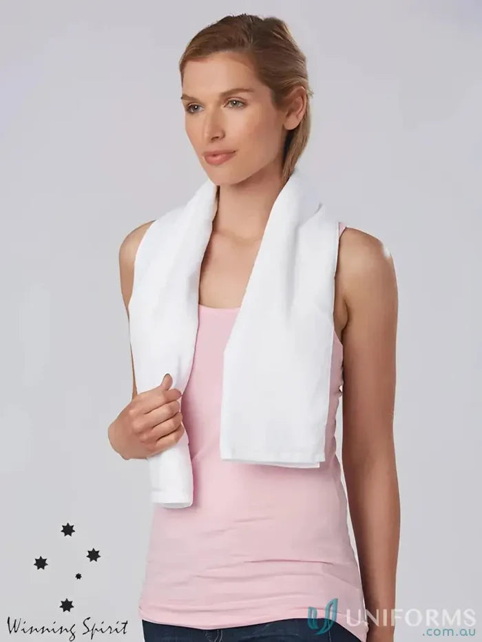 White towel draped around woman’s neck, perfect terry towelling gym fitness towel