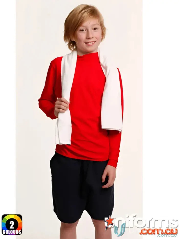 Boy in red long-sleeve shirt and black shorts with a terry towelling gym towel