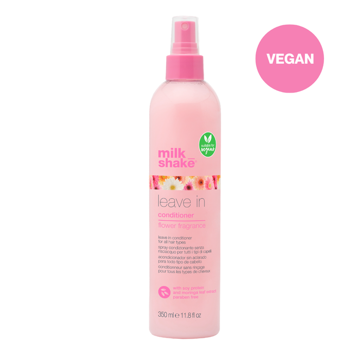 Pink bottle of milk_shake leave-in conditioner with 'Vegan' label on a white background
