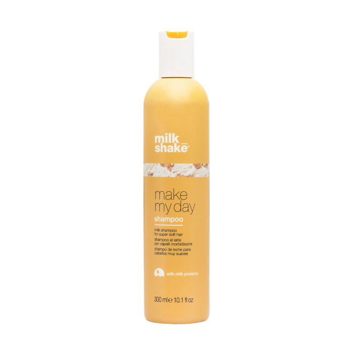 Shampoo bottle labeled 'milk_shake make my day' by milk shake on a white background