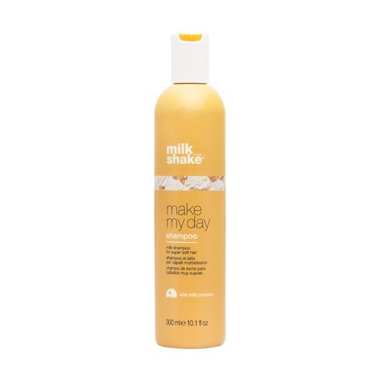 Shampoo bottle labeled 'milk_shake make my day' by milk shake on a white background