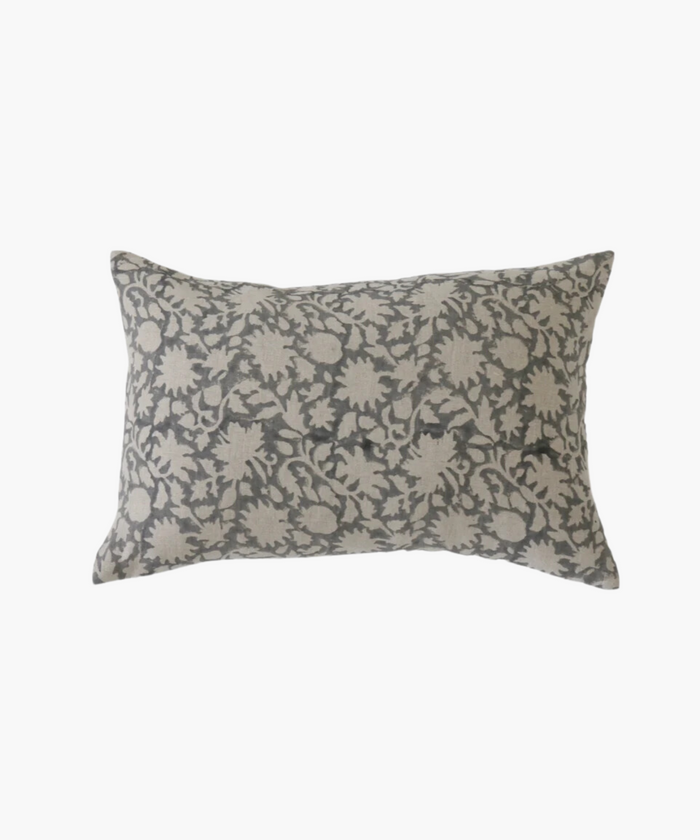 A rectangular lumbar pillow features a floral pattern with beige flowers and vines on a gray background. It conveys a classic and elegant aesthetic. | Wildwood Home Co.