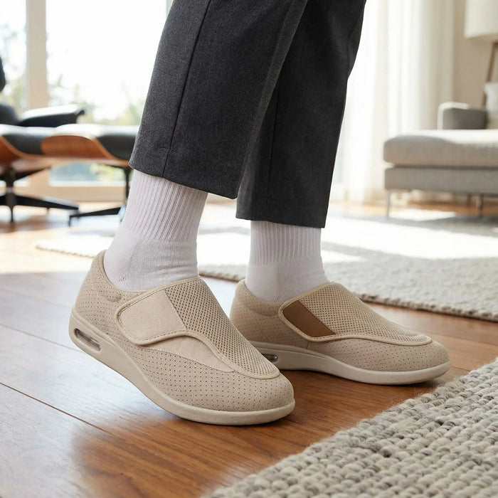 Men's breathable mesh trainers with extra-wide fit and adjustable straps, designed for comfort and support.