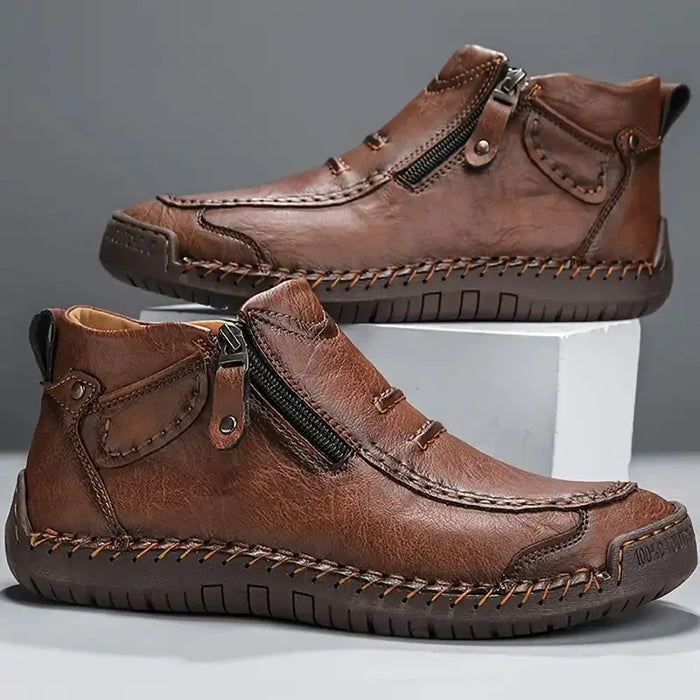 Men's black leather ankle boots with side zipper, stylish casual footwear with orthopedic support and comfortable fit.
