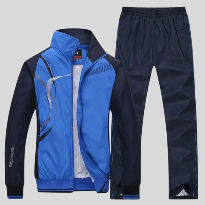 Men's polyester training set with stylish zip-up jacket and matching trousers, designed for comfort and active wear.
