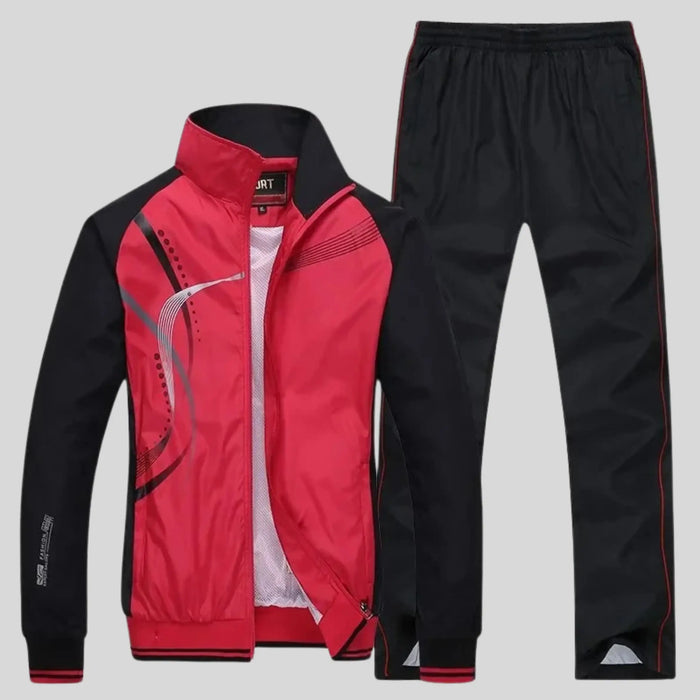 Men's polyester training set with stylish zip-up jacket and trousers, designed for comfort and a balanced fit.