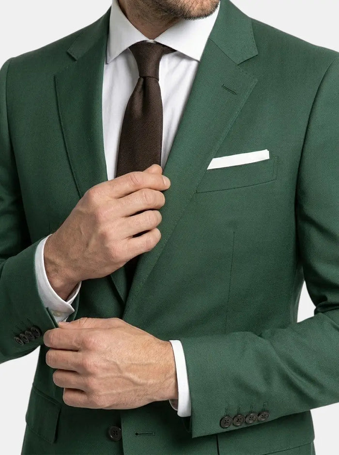 Men’s lightweight fabric suit in classic slim fit, perfect for all-season wear, shown in a natural pose with tailored details.