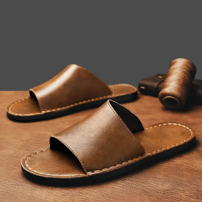 Men's minimalist leather slide sandals with wide straps, designed for comfort and summer wear, by LondonLaneStore.