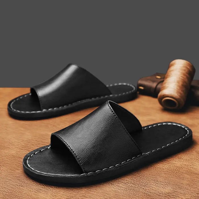 Men's minimalist leather slide sandals with wide straps, comfortable summer footwear for casual wear.