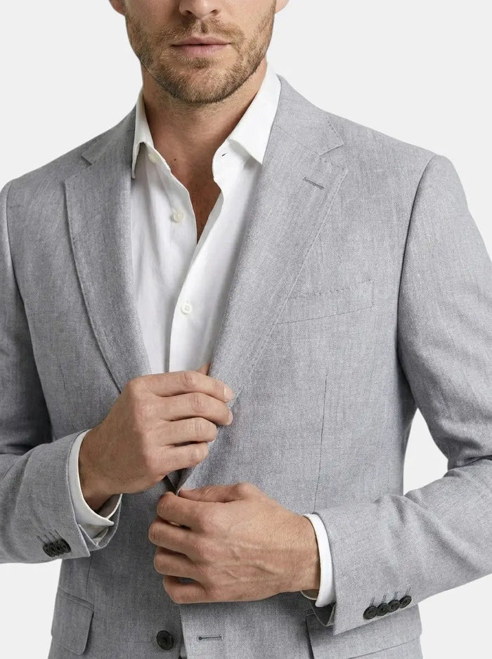 Men's woven suit set featuring a tailored blazer and slim-fit trousers, perfect for formal occasions, by LondonLaneStore.