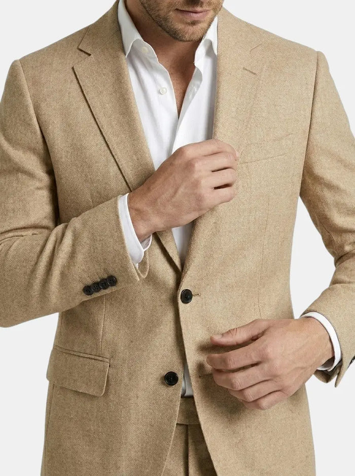 Men's woven suit set featuring a tailored blazer and slim-fit trousers in a classic formal style.