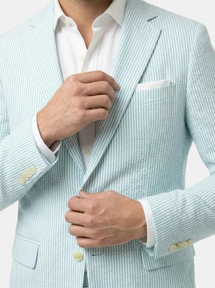 Lightweight Milo men's pinstripe slim fit suit for weddings, shown with notched lapel and tailored fit, in charcoal gray.