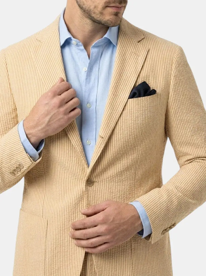 Milo men's lightweight pinstripe slim fit suit for weddings, shown in dark fabric with classic lapel and tailored fit.