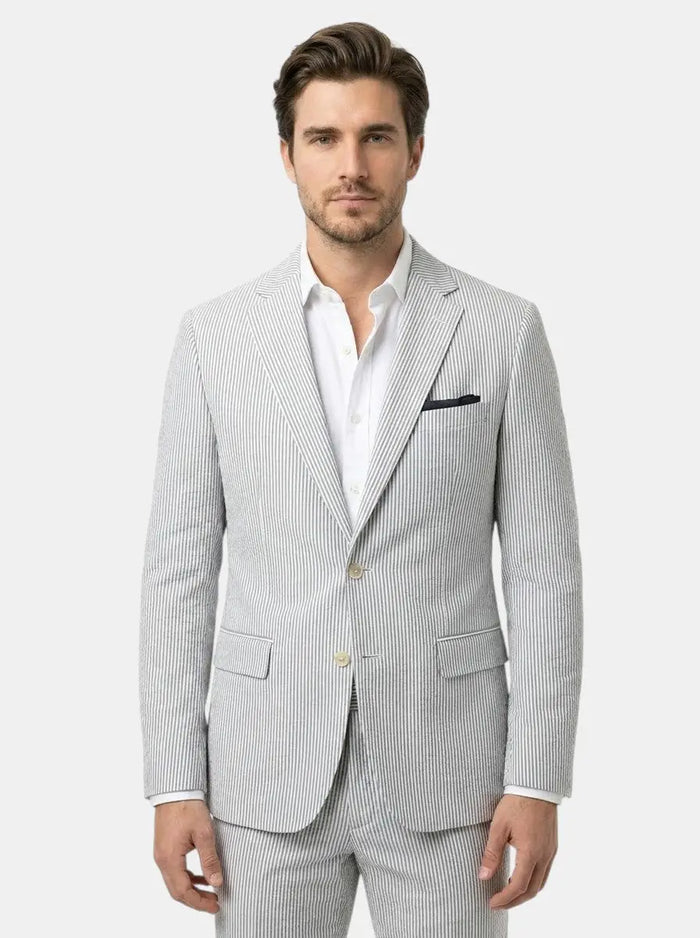 Milo men's lightweight pinstripe slim fit suit for weddings, shown on a hanger with a white shirt and matching tie.