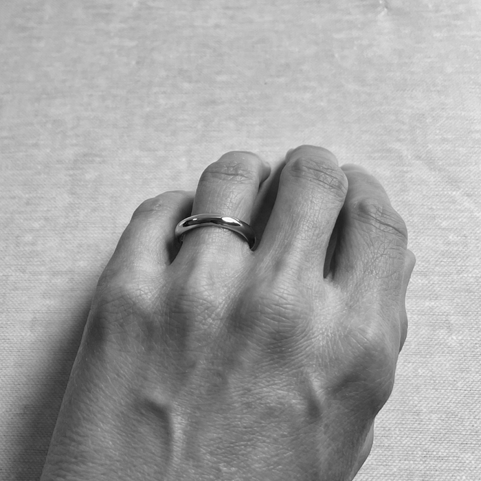 Species by the Thousands curved minimal band in brass.