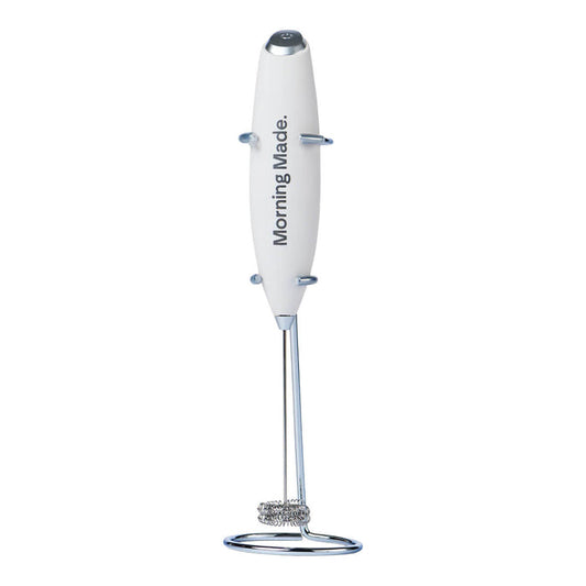 Morning Made Modern Matcha Whisk, a handheld electric mixer to blend matcha green tea and lattes. Made from stainless steel and comes with a kitchen counter stand.